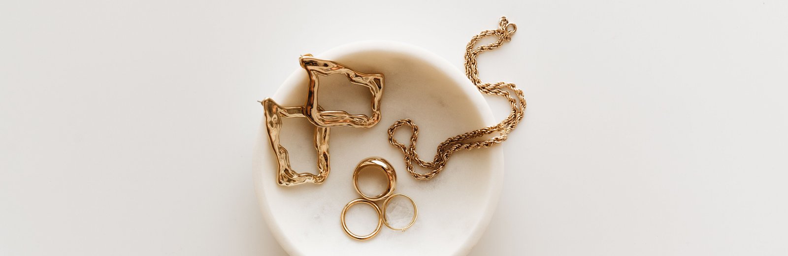 Stack of elegant gold bangles