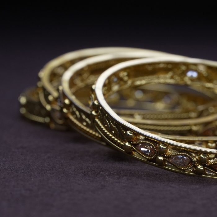 Intricate golden bangles