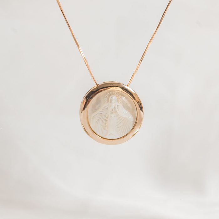 Gold pendant with religious motif